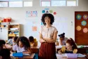 Teacher smiling in classroom